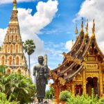 standing statue and temples landmark during daytime